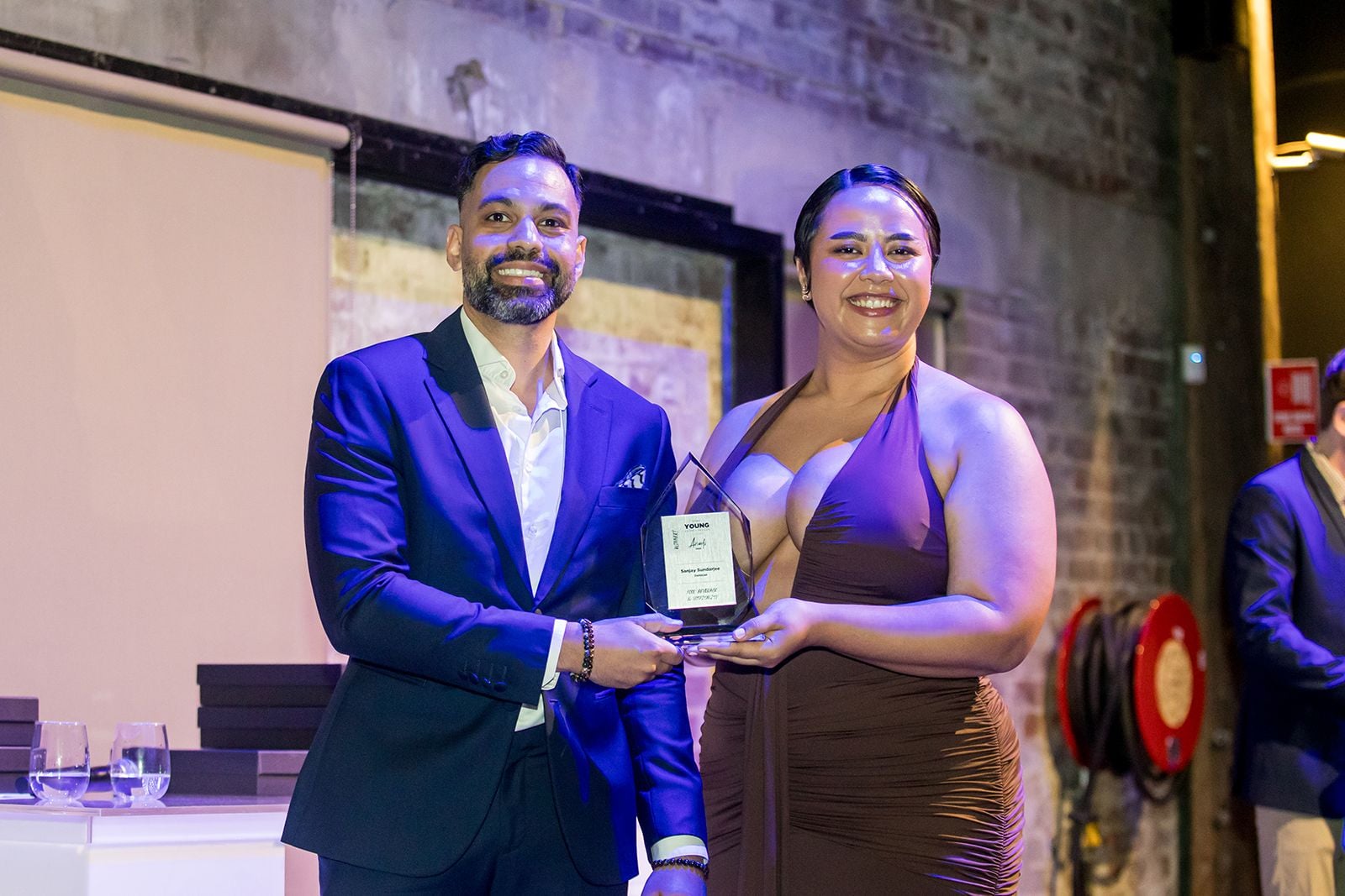 2025 Sydney Young Entrepreneur Awards Gala Dinner Winners accepting trophies on stage at the 2025 Sydney Young Entrepreneur Awards